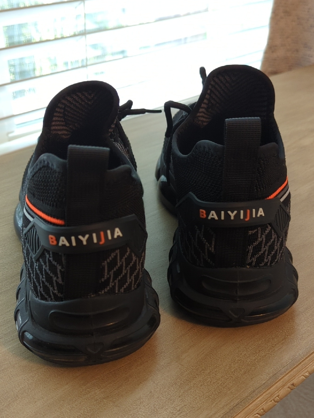 BAIYIJIA Black Athletic Sneakers with Orange Accent